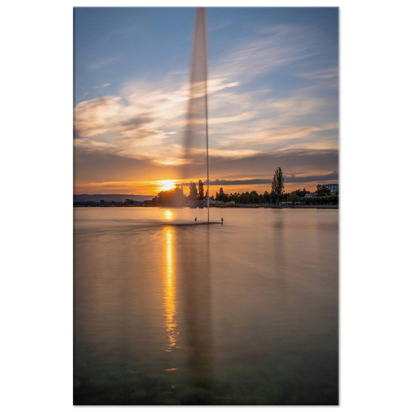 Leinwand - Wasserfontäne im Zugersee bei Sonnenuntergang