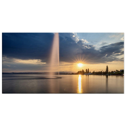 Leinwand Wasserfontäne am Zugersee bei Sonnenuntergang